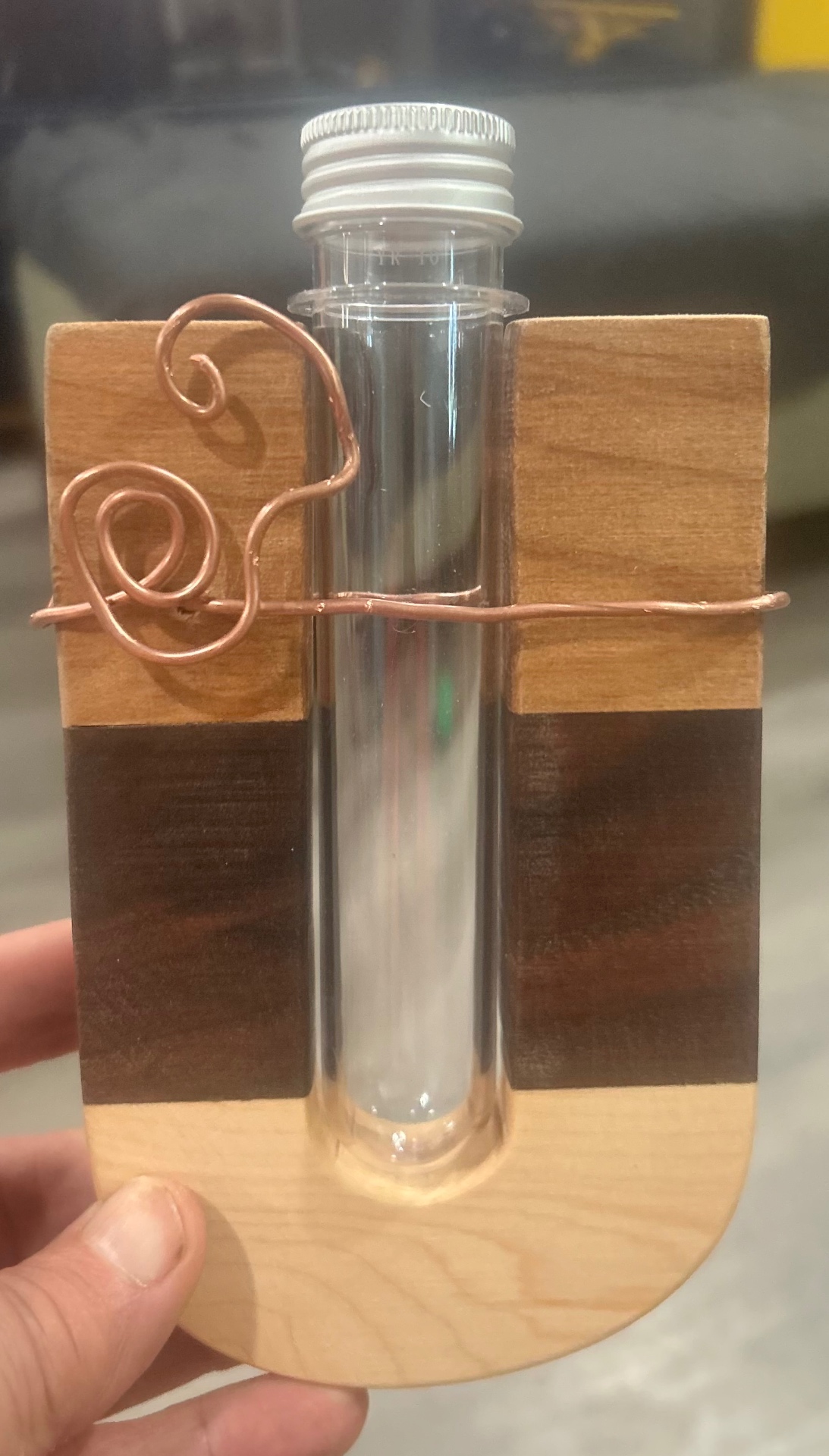 Wood bud vase with glass tube and copper wire detail