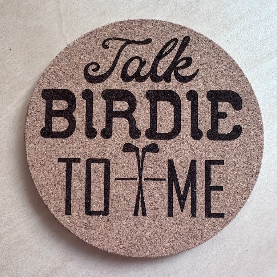 Round cork coaster engraved: Talk birdie to me