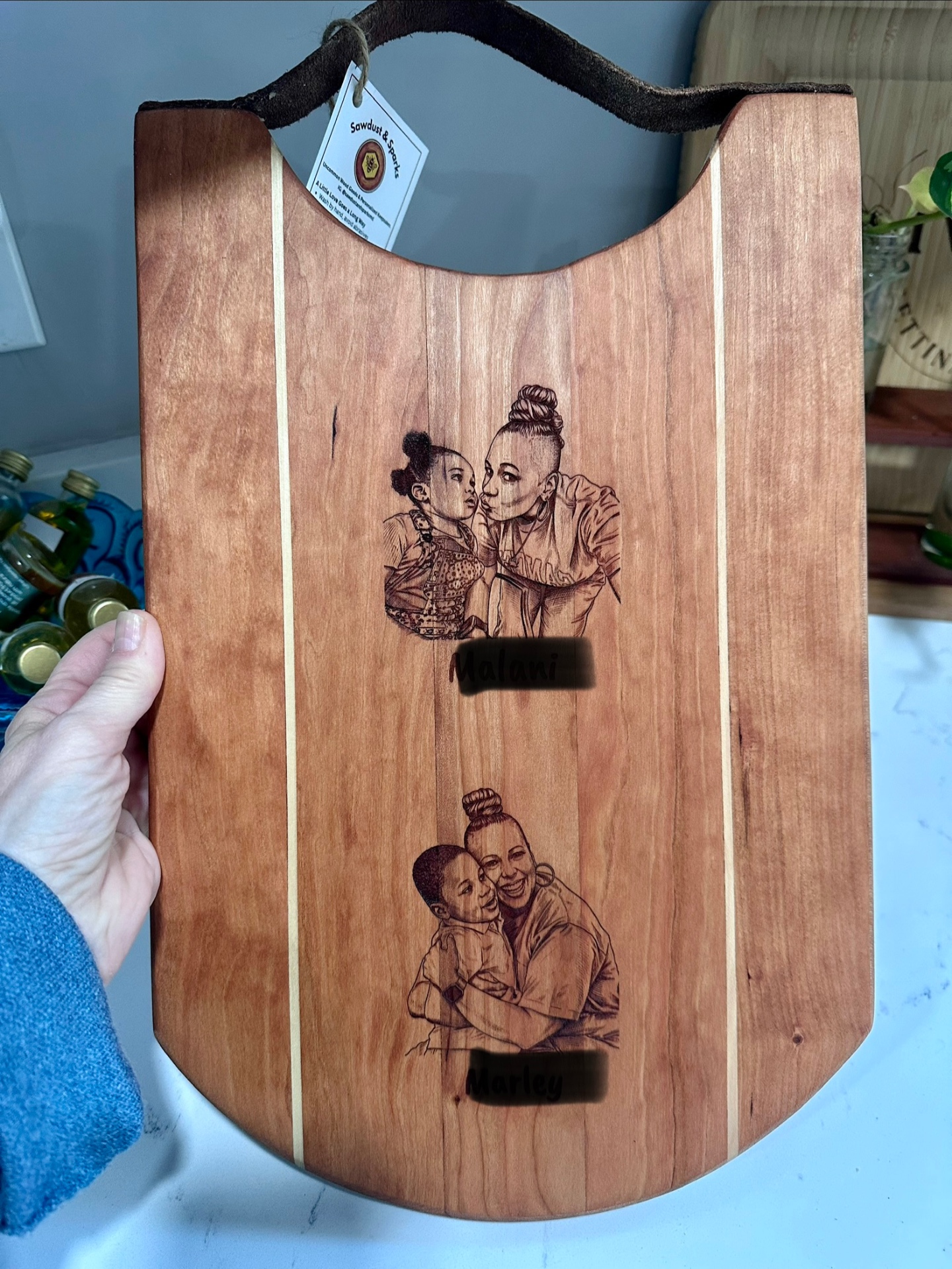 Cherry portrait board engraved with family illustrations