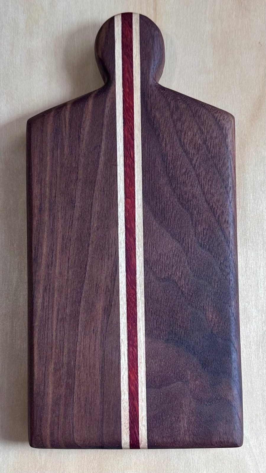 Baby Board - walnut paddle-style mini board with red and maple inlay stripe