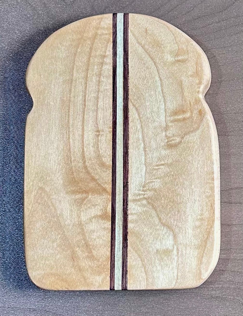 Baby Board - maple toast-shaped mini board, top view