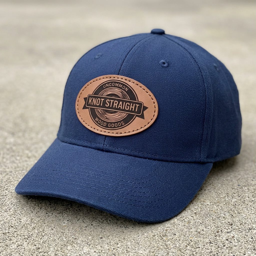 Branded leather patch on navy ball cap